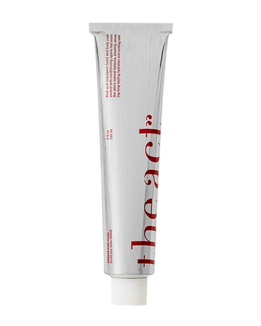 An aluminium tube of whipped body cream with honey and shea butter
