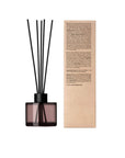 The Act VIRGIN Diffuser reed sticks and glass vessel detail — same fragrance as The Act Relaxing Massage Oil VIRGIN
