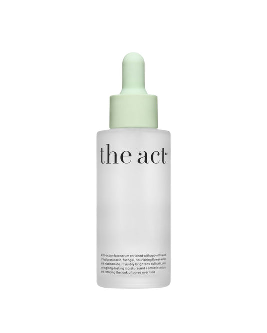 Hydrating and plumping face serum in glass bottle with dropper