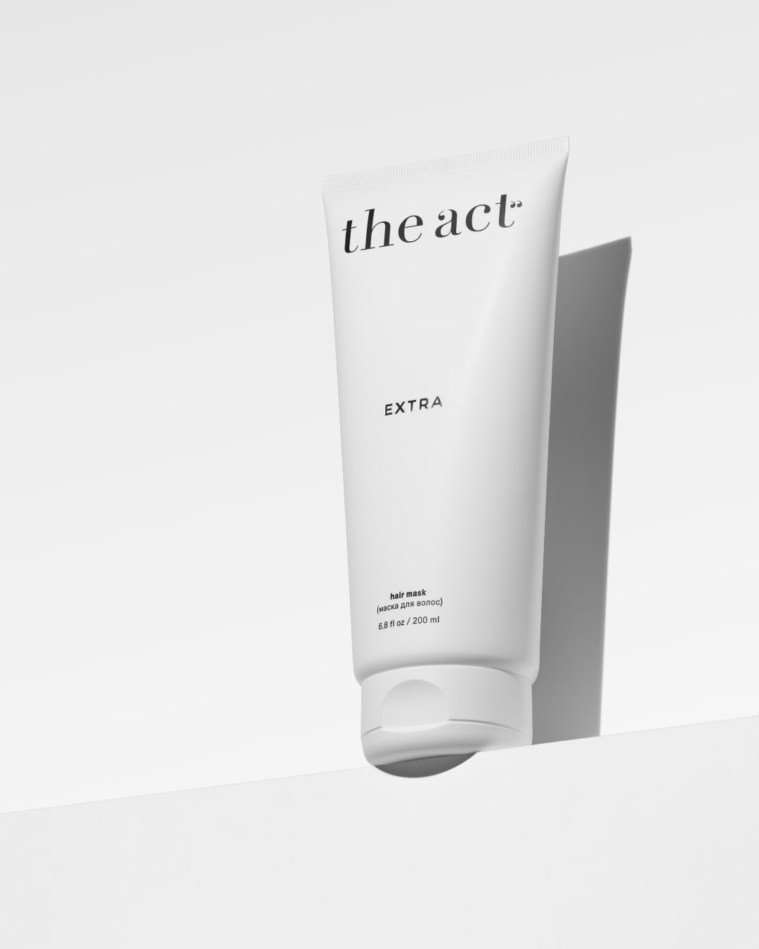 White tube of hair mask display