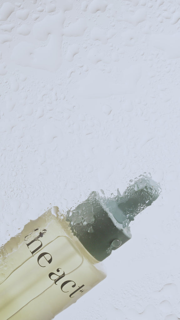Vegan Clarifying Face Serum with natural oils in a glass bottle clip