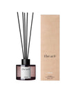 The Act Aromatic Diffuser VIRGIN in glass vessel — reed diffuser in cherry blossom, cherry, almond, currant, and pink grapefruit
