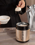 How to use The Act Coconut Scrub 2000g — apply to wet skin, massage and rinse